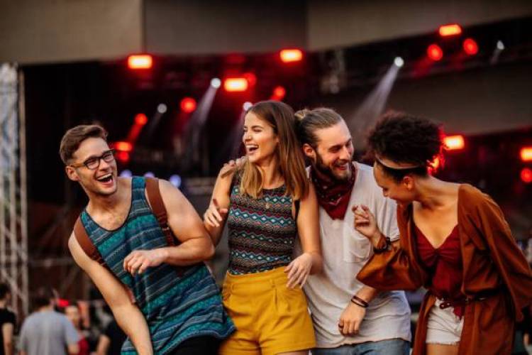 Friends enjoying a music festival in Telluride