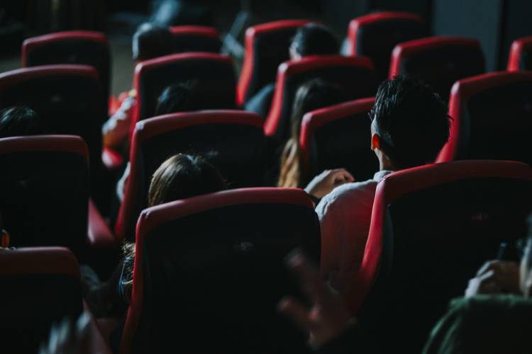 People sitting in a movie theater