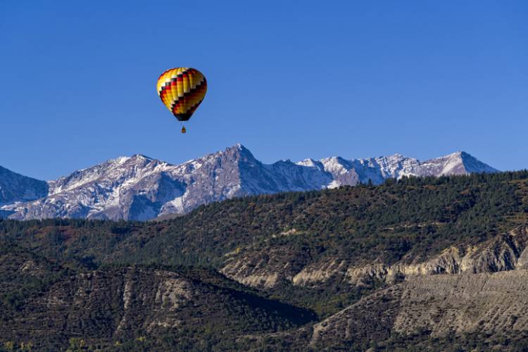 A hot air balloon flying near Telluride, CO