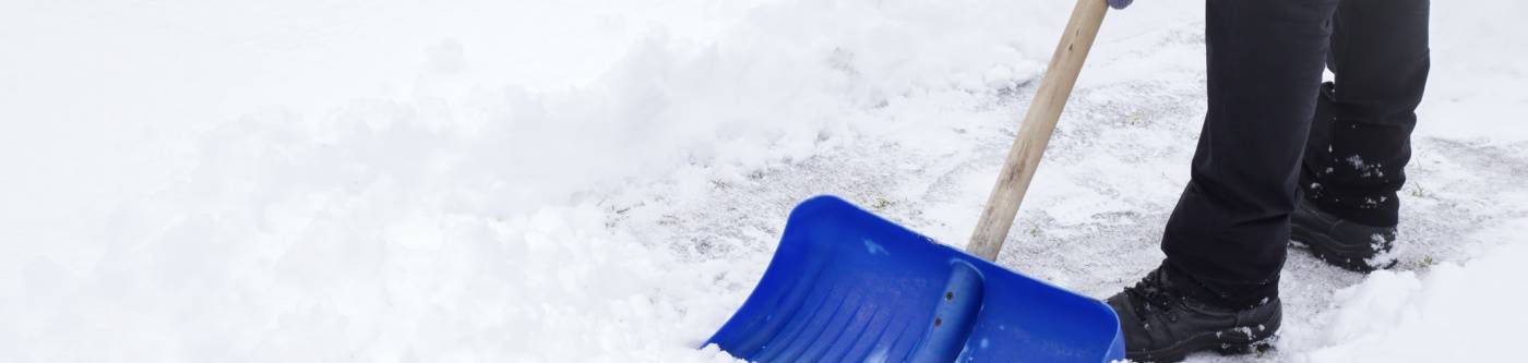 A man shoveling snow